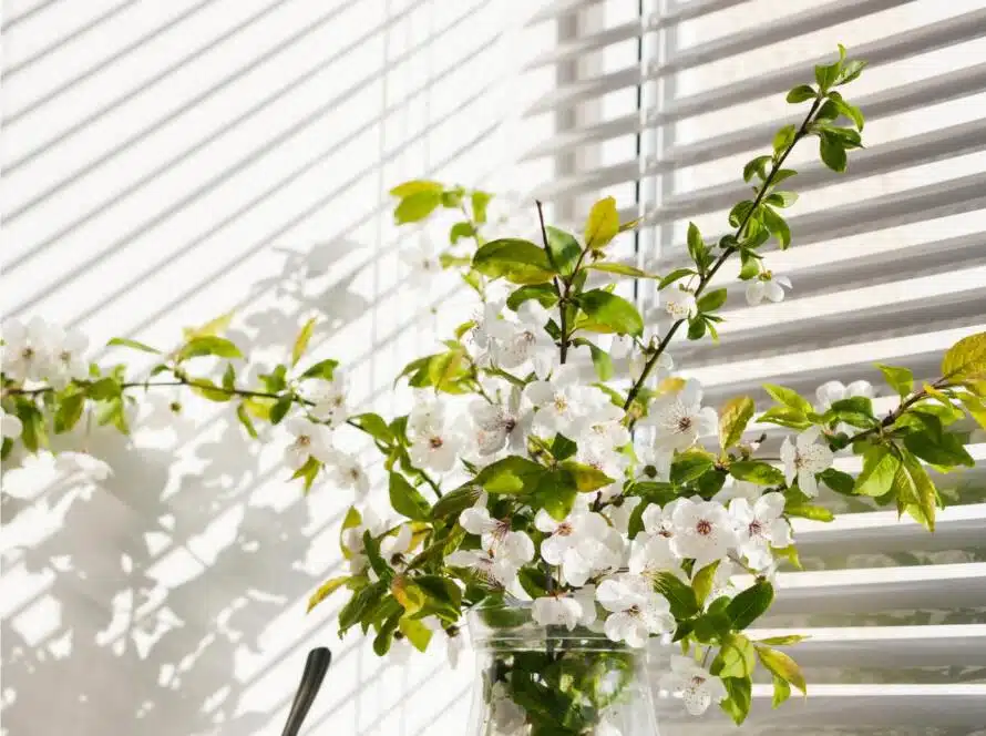 Modern window blinds in bold blue shade for living room décor